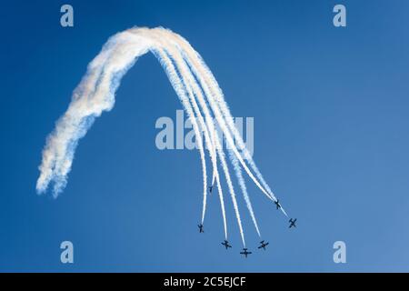 Moscow Region - July 21, 2017: Aerobatic display team from the United Arab Emirates in the blue sky at the International Aviation and Space Salon (MAK Stock Photo