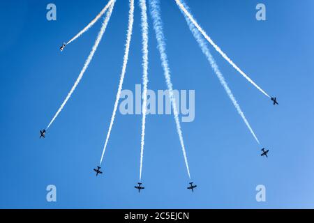 Moscow Region - July 21, 2017: Aerobatic display team from the United Arab Emirates in the blue sky at the International Aviation and Space Salon (MAK Stock Photo