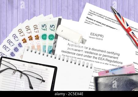 English form EEA PR application for a document certifying permanent residence or permanent residence card under the EEA regulations from UK visas and Stock Photo