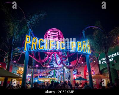 Pacific Park at night on Santa Monica Pier in Southern California Stock Photo