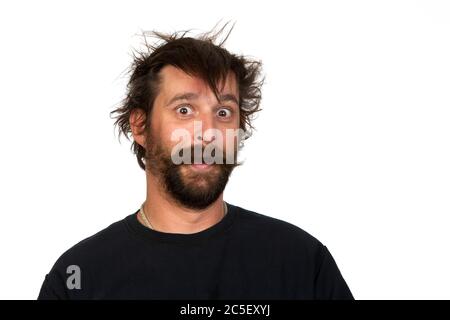 Goofy hipster man, with handlebar moustache and bread, against white background. Stock Photo