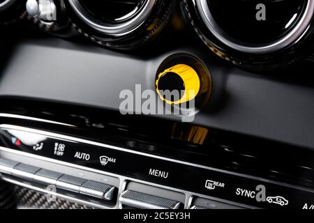 Car interior details, close up dashboard with buttons Stock Photo