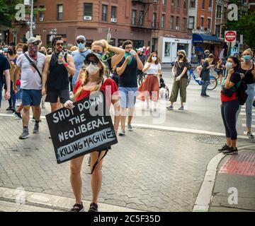 Black Lives Matter demonstrators march in Greenwich Village in New York protesting the death of George Floyd, seen on on Juneteenth, Friday, June 19, 2020. (© Richard B. Levine) Stock Photo