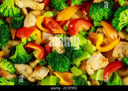 Fresh healthy vegetable salad with bell pepper and chicken. Close up. Stock Photo