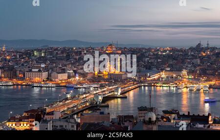 City view at dusk, Yeni Cami mosque and mosque Beyazit Camii, Galata Bridge, Golden Horn, Bosporus, Yeni Cami, mosque, Fatih, Istanbul, European Stock Photo