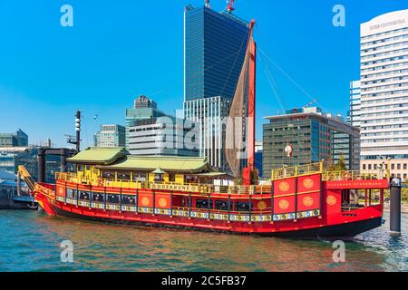 tokyo, japan - april 04 2020: Red Gozabune sailboat replicates luxury yachts used in the Edo period for Tokugawa emperors or shoguns used as a restaur Stock Photo