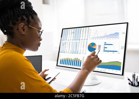 African American Business Data Analyst Woman Using Computer Stock Photo