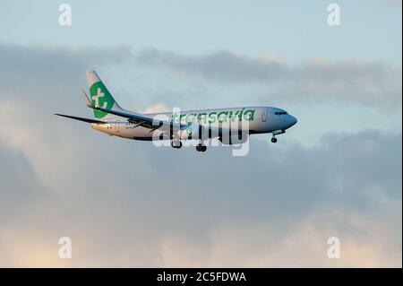 Helsinki / Finland - APRIL 25, 2018: Transavia Boeing 737 landing at Helsinki-Vantaa Airport. Stock Photo