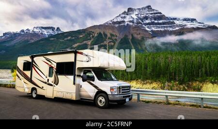 Motorhome RV Camper In Perfect Mountain Landscape Scenic Highway Roadtrip
