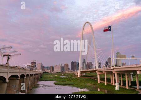 View of Downtown Dallas Skyline in Between the Margaret Hunt Hill Bridge and the Margaret McDermott Bridge Stock Photo