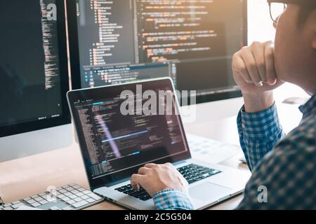 Stress developing programming looking coding technology working on computer. Stock Photo