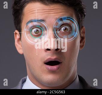 The concept of sensor implanted into human eye Stock Photo