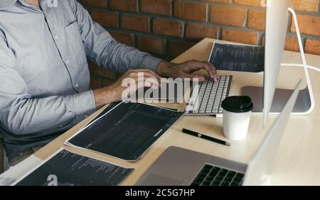 Stress developing programming looking coding technology working on computer. Stock Photo
