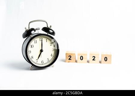 A black alarm clock isolated against white background Stock Photo