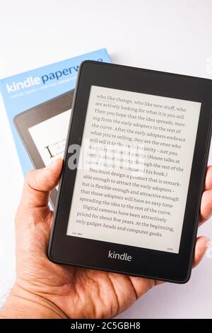 Amazon Kindle Paperwhite 2019 is Amazon e-book reader that is lightweight and waterproof Stock Photo