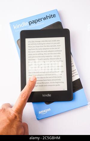 Amazon Kindle Paperwhite 2019 is Amazon e-book reader that is lightweight and waterproof Stock Photo