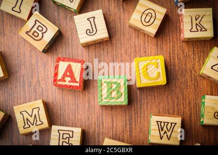 ABC blocks arranged in stack, education and kids background Stock Photo