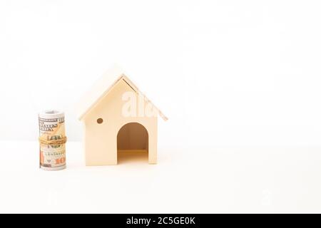Miniature wooden house isolated against white background Stock Photo ...