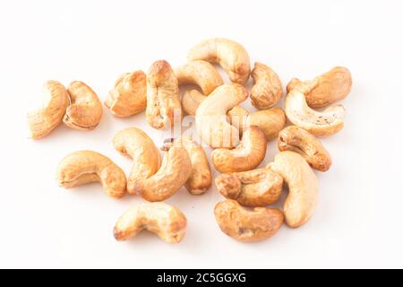Cashew nuts isolated against white Stock Photo