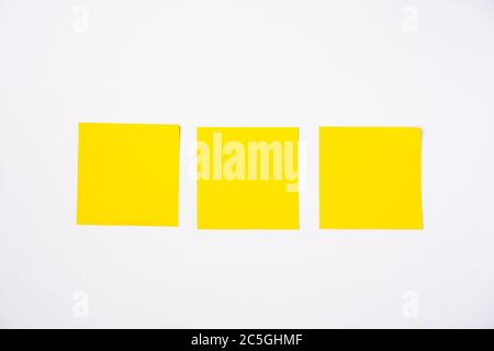Sticky notes against white background, copy space for text Stock Photo