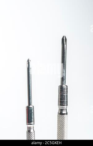 a set of mini screwdrivers isolated against white background Stock Photo