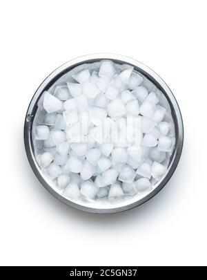Cold ice cubes in metal bowl isolated on white background. Stock Photo