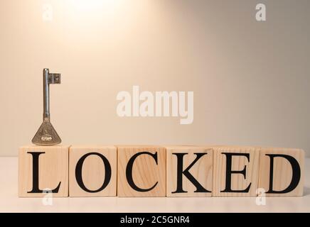 Lock word made of wooden cubes. It's about computer and security. Stock Photo