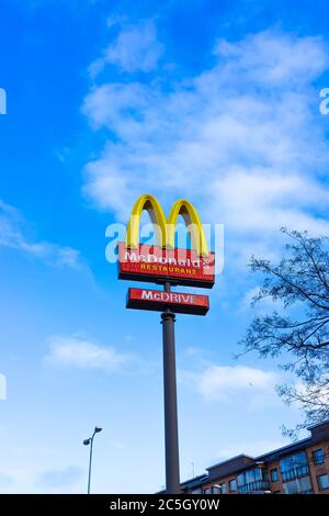 Finland, Kotka - February 18, 2020:  McDonald's restaurant fast food sign. Drive in or drive thru, mcauto service sign. The McDonald's Corporation is Stock Photo