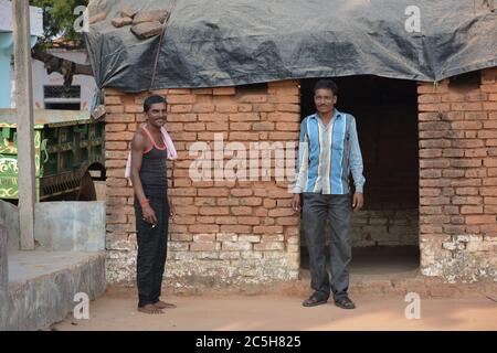 TIKAMGARH, MADHYA PRADESH, INDIA - NOVEMBER 15, 2019: Two Indian rural farmer looking at the camera. Stock Photo