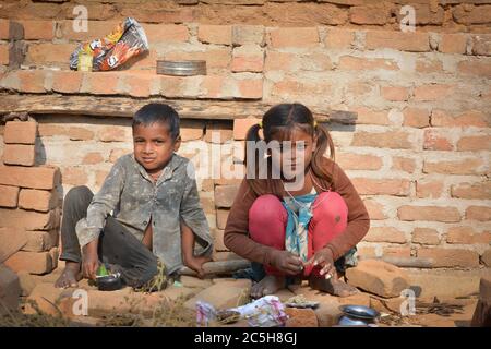 TIKAMGARH, MADHYA PRADESH, INDIA - NOVEMBER 15, 2019: Unidentified indian children looking curious into the camera. Stock Photo