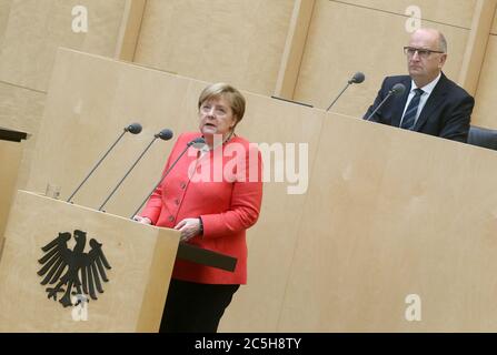 Berlin, Germany. 03rd July, 2020. Chancellor Angela Merkel (CDU) gives a speech in the Bundesrat on the objectives of the EU Council Presidency. Dietmar Woidke (SPD), President of the Bundesrat, follows the speech. Credit: Wolfgang Kumm/dpa/Alamy Live News Stock Photo