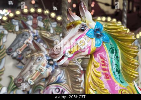 Carousel horse detail of a traditional painted funfair ride. Stock Photo