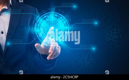 Businessman Scanning Fingerprint For Identification Touching Virtual Panel, Blue Background Stock Photo