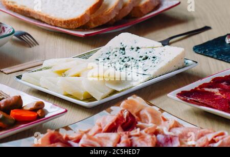 Cheese and bread isometric design. Assorted tapas from Spain Stock Photo