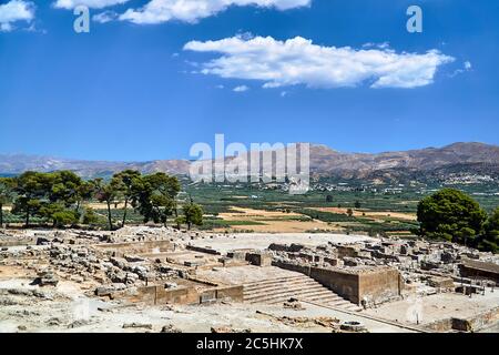 stone ruins of the ancient Phaistos Minoan Palace on the island of Crete in Greece Stock Photo
