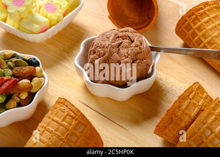 side view chocolate flavor ice cream with marshmallows and various nuts Stock Photo