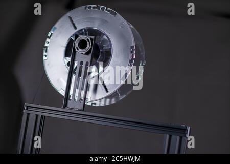 Filament for 3D Printer beeing used for printing. Stock Photo