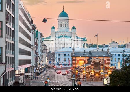 Helsinki, Finland - July 27, 2018: Helsinki Cathedral, Old City Market Hall, Eteläranta street on sunset sky background Finland Stock Photo