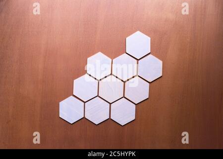 A simple white texture pattern of hexagons as a background Stock Photo