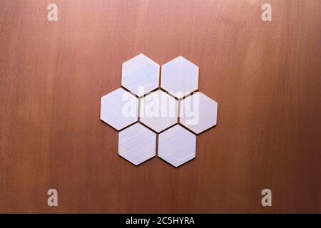 A simple white texture pattern of hexagons as a background Stock Photo