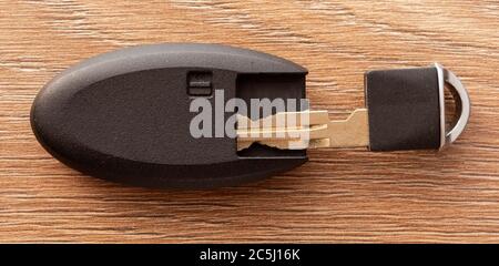 Close up car keys and electronic fob on a wooden background Stock Photo