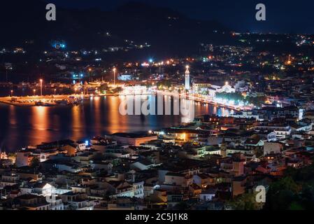 Aerial night view of Zakynthos Zante town. Beautiful cityscape panorama of Greece city. Traveling concept background. Stock Photo