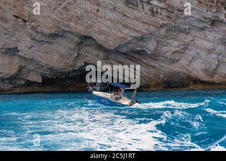 ZAKYNTHOS, GREECE, September 27, 2017: Blue Caves and blue water of Ionian sea on Island Zakynthos in Greece and sightseeing points. Rocks in clear Stock Photo
