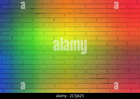Colored rainbow of grunge wall background. Idea of colorful painted old vintage grungy brick wall texture. Stock Photo