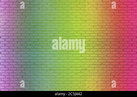 Colored rainbow of grunge wall background. Idea of colorful painted old vintage grungy brick wall texture. Stock Photo