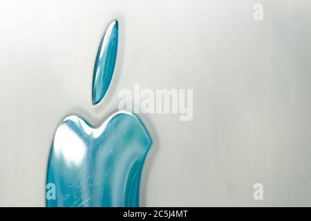 Abstract view of a well-known Computer logo seen on the side of a vintage desktop computer. Stock Photo