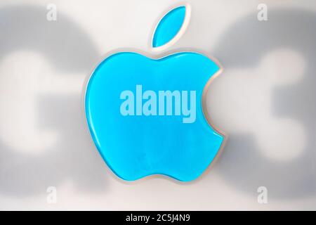Abstract view of a well-known Computer logo seen on the side of a vintage desktop computer. Stock Photo