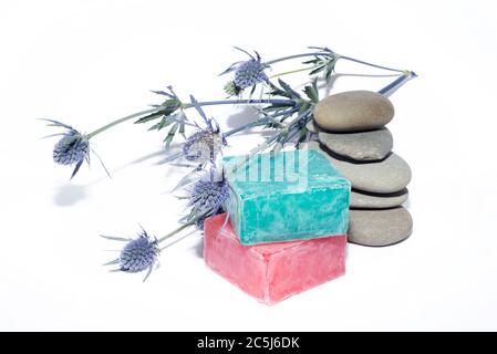 soaps off various shades with grey sone pebbles and lavender Stock Photo