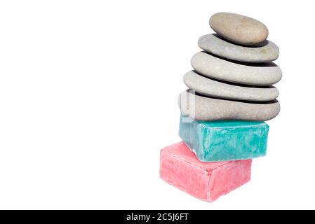 soaps off various shades with grey sone pebbles Stock Photo