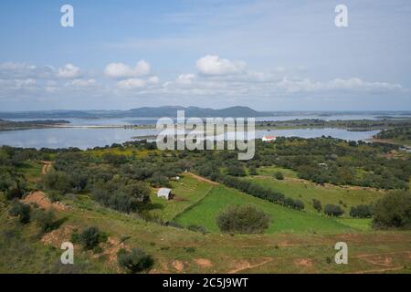 Lake water reservoir of Alqueva Dam landscape from Mourao castle in Alentejo, Portugal Stock Photo